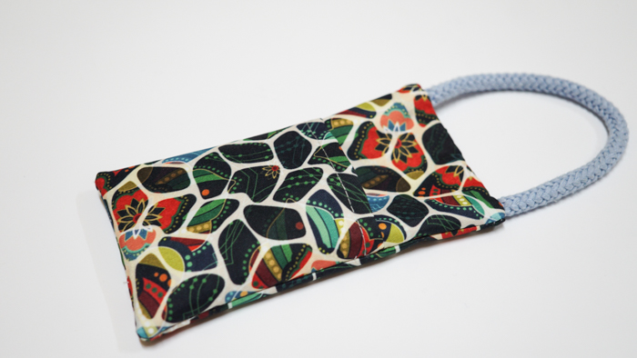 Hanging phone case and cable holder 44