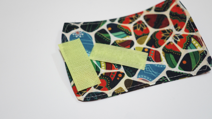 Hanging phone case and cable holder 52