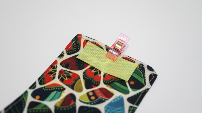 Hanging phone case and cable holder 53