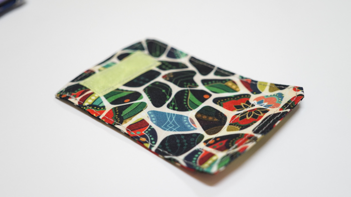 Hanging phone case and cable holder 55